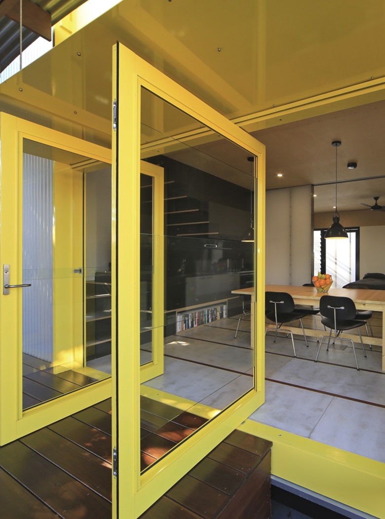 yellow pivot doors residential 